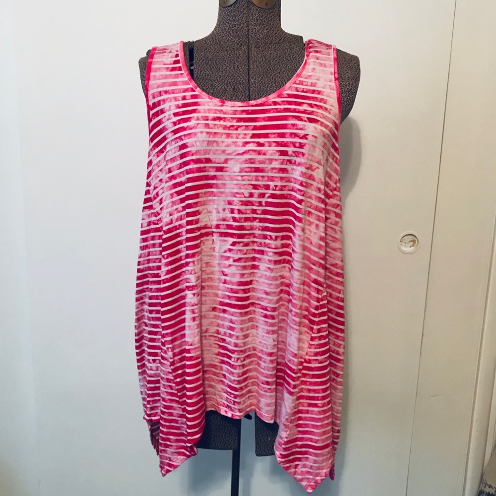 Soft striped tank top with handkerchief hem.